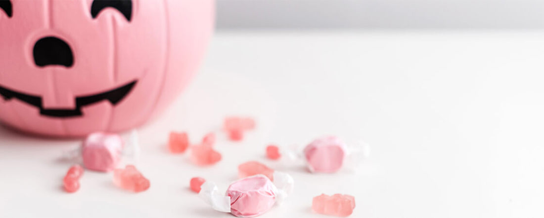 pink jack-o-lantern with pink Halloween candy