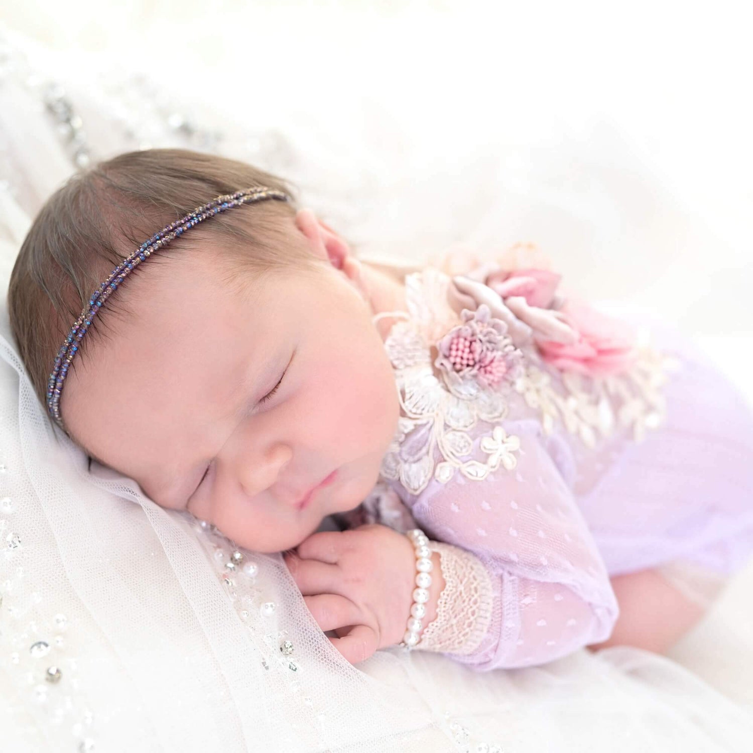 Tiny heirloom baby pearl bracelets for newborn baby girls.