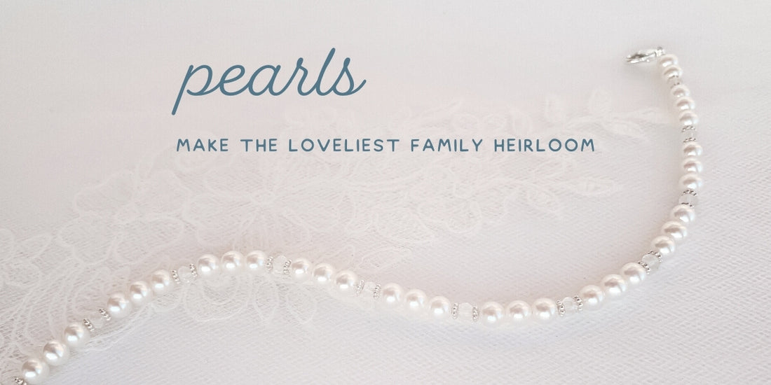pearl necklace draped over lace - words say pearls make the loveliest family heirloom.