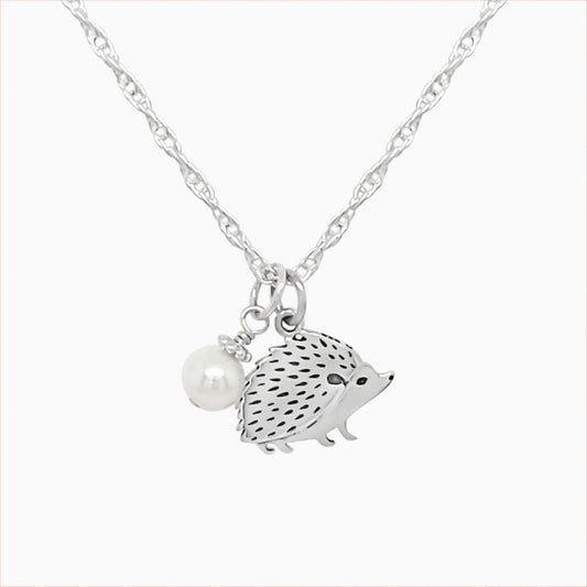 Mama hedgehog necklace in sterling silver with a pearl.